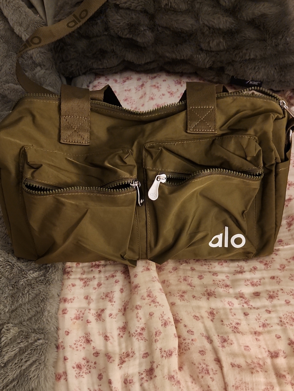 ALO Yoga Olive Duffel with Front Zip Pockets.